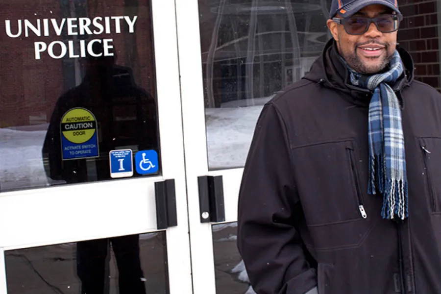 Dementro Powell stands in front of the U. of I. Public Safety Building on Feb. 17, 2021.